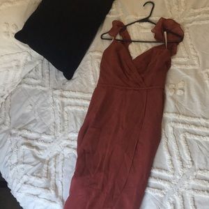 Never worn, tags still on. David’s Bridal bridesmaid dress, size 2, Cinnamon.